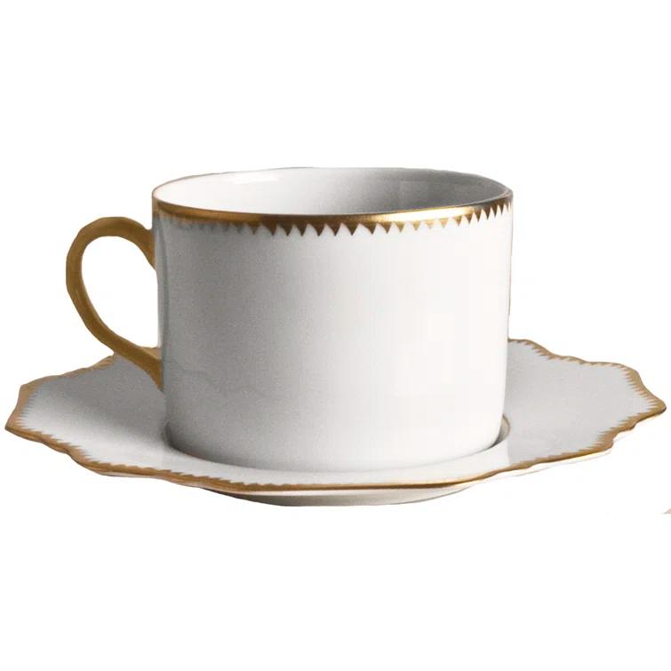 White and Gold Ceramic Teacup with Saucer