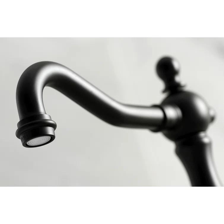 Kingston Brass Heritage Two-Handle 3-Hole Deck Mount Widespread Bathroom Faucet with Brass Pop-Up Drain
