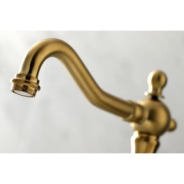 Kingston Brass Heritage Two-Handle 3-Hole Deck Mount Widespread Bathroom Faucet with Brass Pop-Up Drain