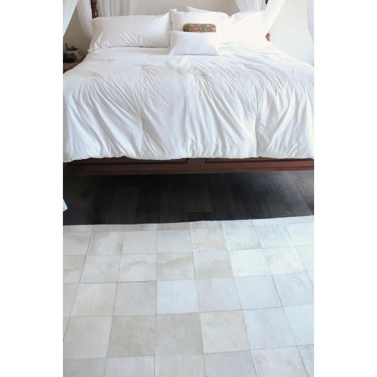 Exquisite Rugs Natural Hide Hand Stitched Leather Hide on Felt White Area Rug & Reviews | Wayfair