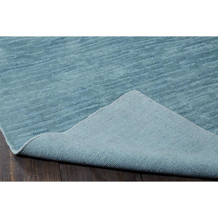 Kozeroff Blue Area Rug
