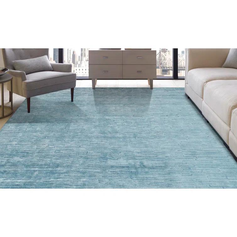 Kozeroff Blue Area Rug