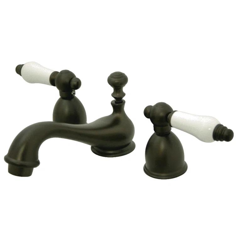 Kingston Brass Restoration Two-Handle 3-Hole Deck Mount Mini-Widespread Bathroom Faucet with Brass Pop-Up