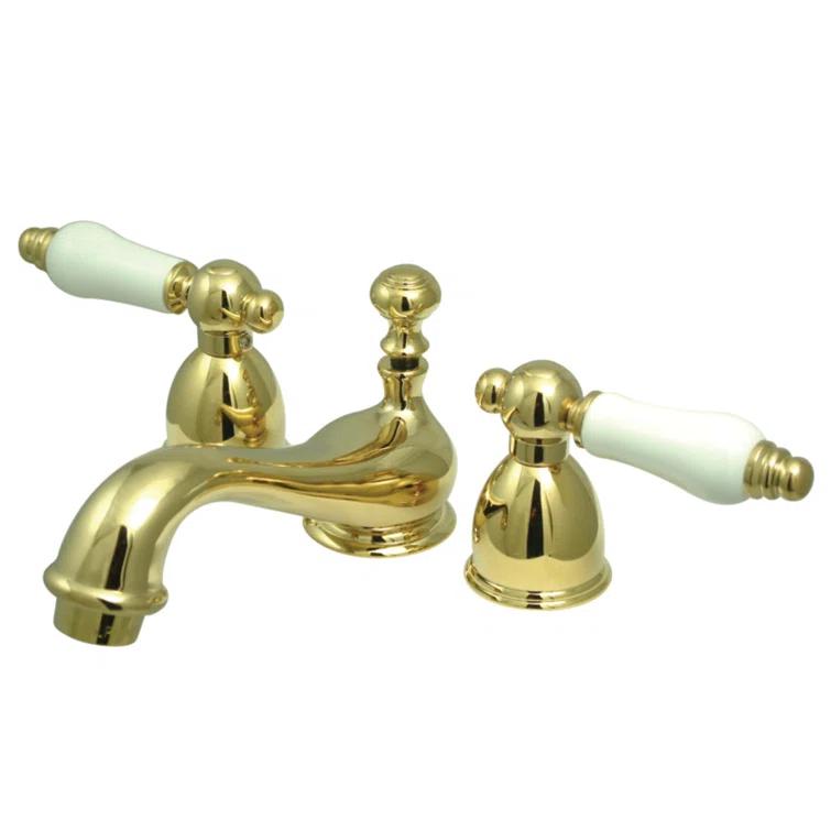 Kingston Brass Restoration Two-Handle 3-Hole Deck Mount Mini-Widespread Bathroom Faucet with Brass Pop-Up