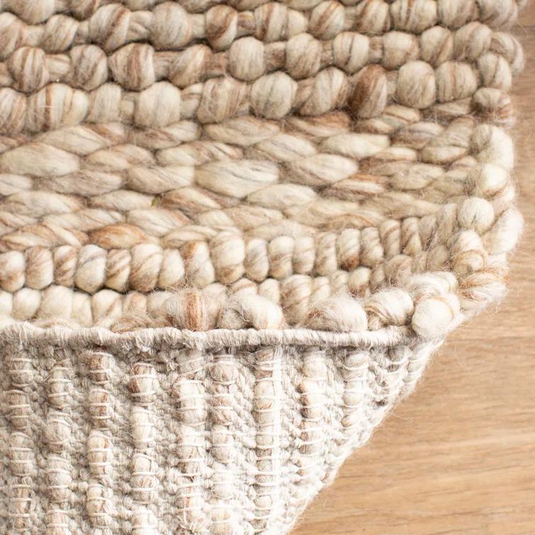 Ivory Braided Elegance 5' x 8' Handmade Wool Area Rug