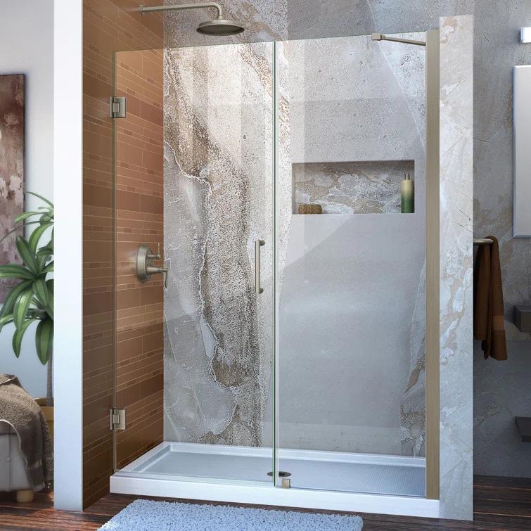 Unidoor 57" W x 72" H Hinged Frameless Shower Door and Fixed Panel with ClearMax Glass Treatment