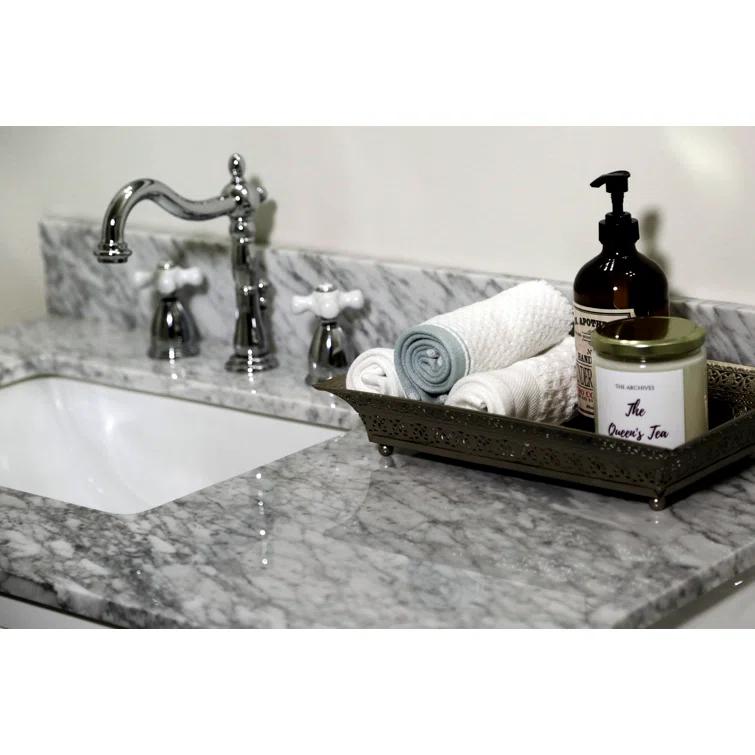 Kingston Brass Heritage Two-Handle 3-Hole Deck Mount Widespread Bathroom Faucet with Pop-Up Drain
