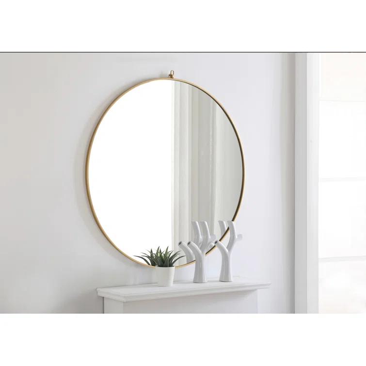 Cassie Metal/Manufactured Wood Round Wall Mirror