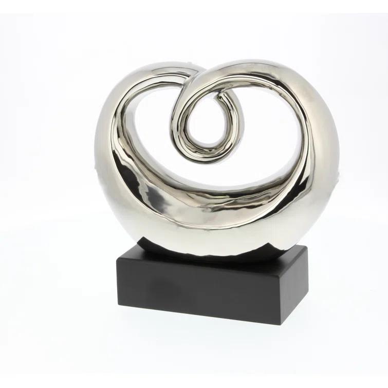 Wrought Studio™ Allye Ceramic Swirl Abstract Decorative Silver Sculpture with Black Base