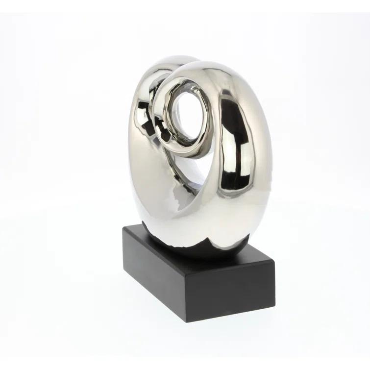 Wrought Studio™ Allye Ceramic Swirl Abstract Decorative Silver Sculpture with Black Base