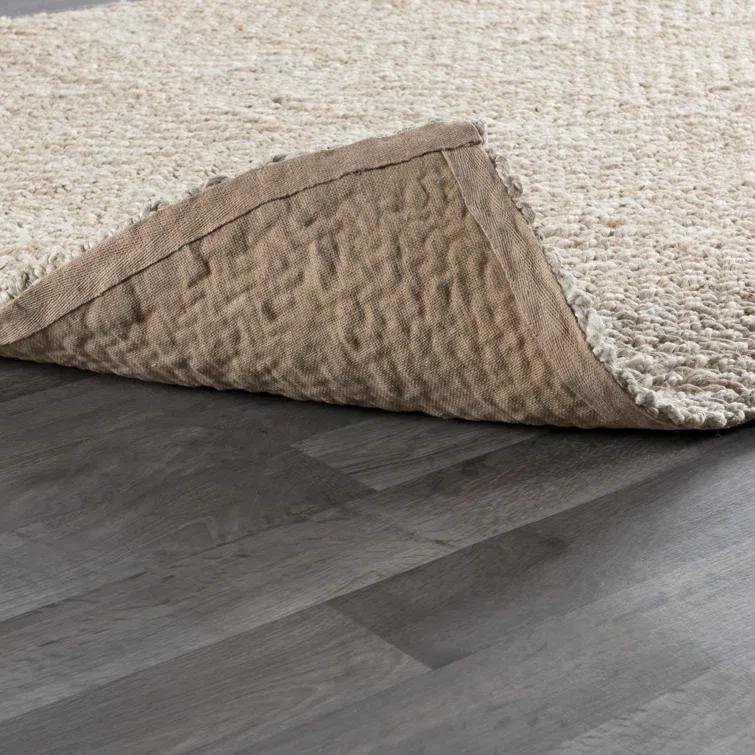 Jiona Handmade Flatweave Jute Ivory Area Rug