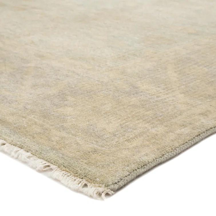 Eloquent Wool Oriental Area Rug in Beige