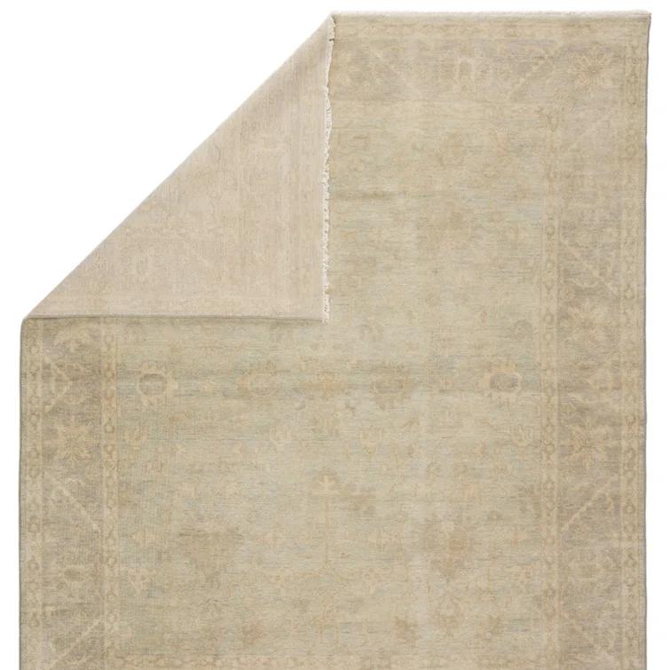Eloquent Wool Oriental Area Rug in Beige