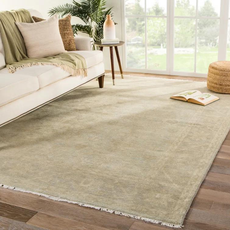 Eloquent Wool Oriental Area Rug in Beige