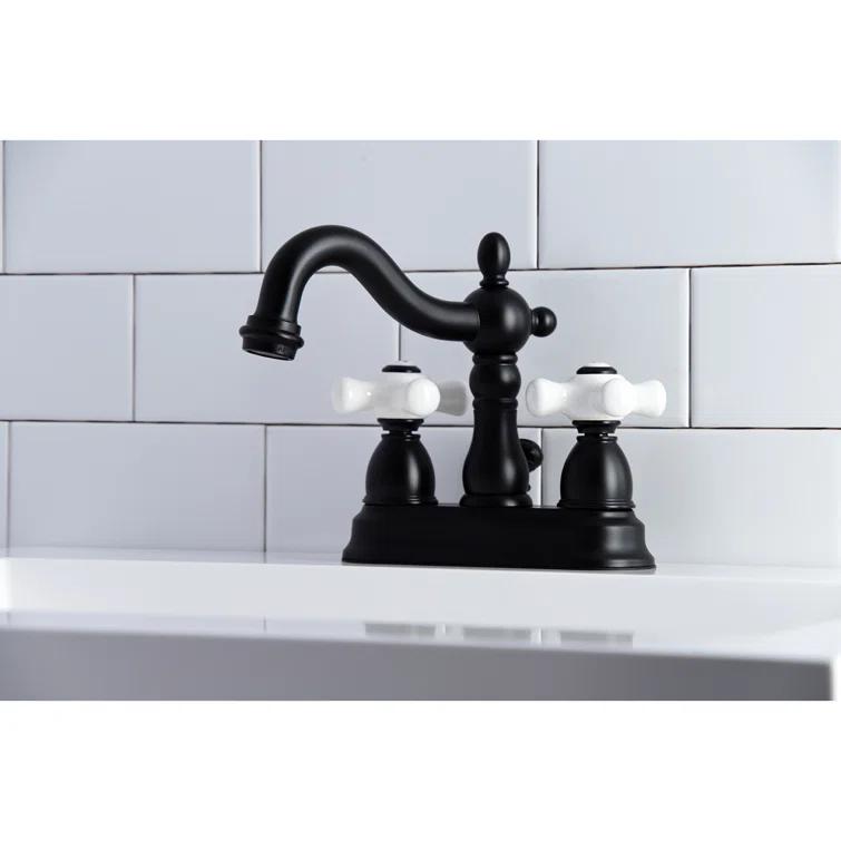 Kingston Brass Heritage Two-Handle 3-Hole Deck Mount 4" Centerset Bathroom Faucet with Plastic Pop-Up