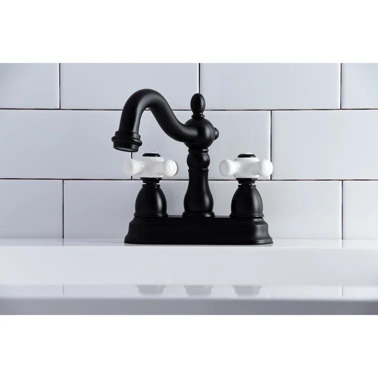 Kingston Brass Heritage Two-Handle 3-Hole Deck Mount 4" Centerset Bathroom Faucet with Plastic Pop-Up