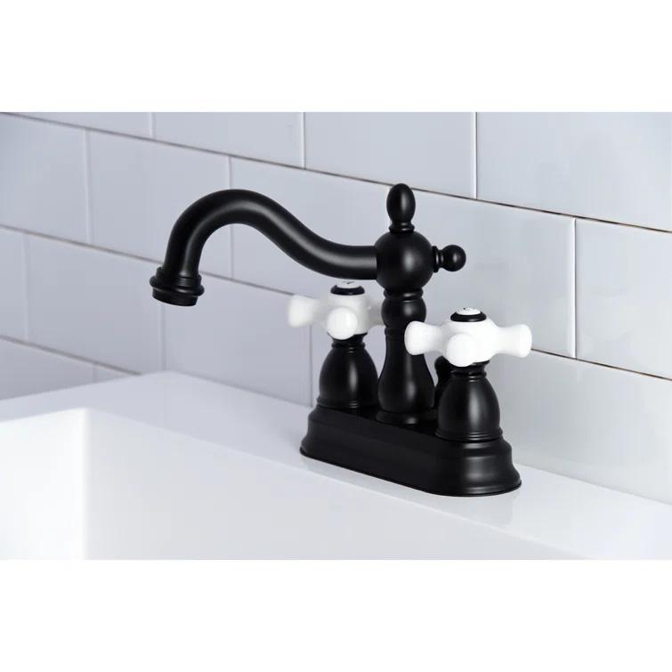 Kingston Brass Heritage Two-Handle 3-Hole Deck Mount 4" Centerset Bathroom Faucet with Plastic Pop-Up