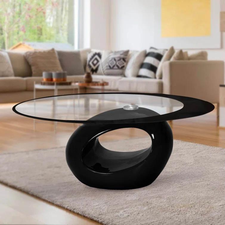 Orren Ellis Glass Top Coffee Table