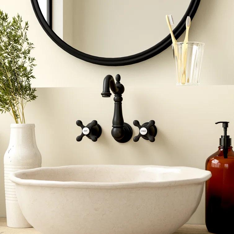 Kingston Brass Heritage Two-Handle 3-Hole Wall Mount Bathroom Faucet