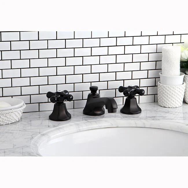 Kingston Brass Duchess Two-Handle 3-Hole Deck Mount Widespread Bathroom Faucet with Brass Pop-Up Drain