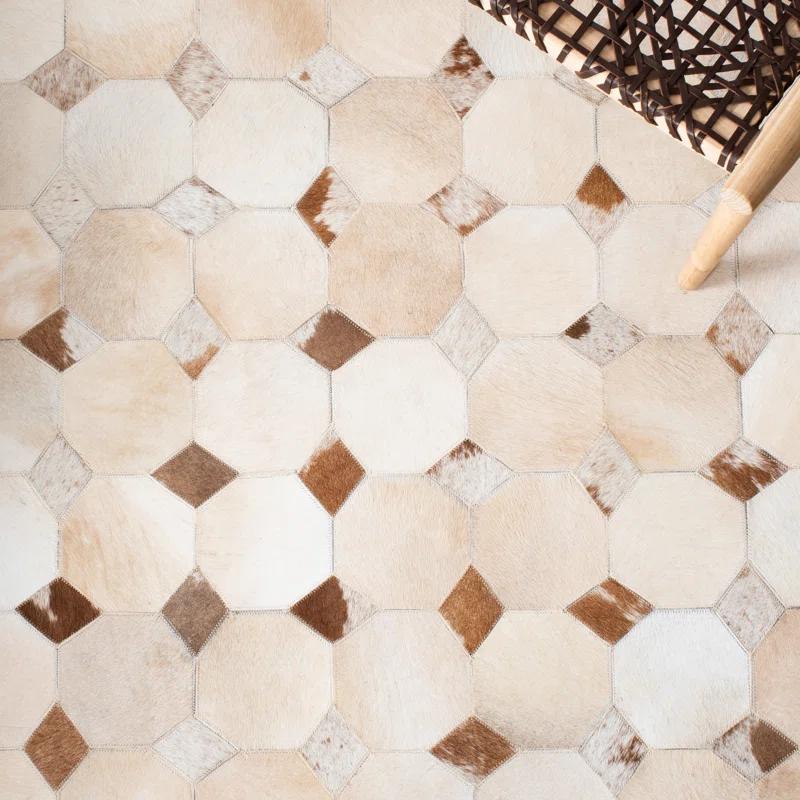 Loon Peak® Bersa Flat Weave Hair On Leather Geometric Rug