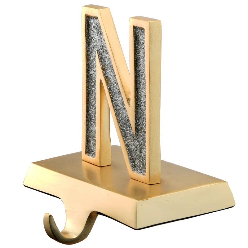 The Holiday Aisle® 5" Silver Sparkle NOEL Stocking Holders, 4-Pieces