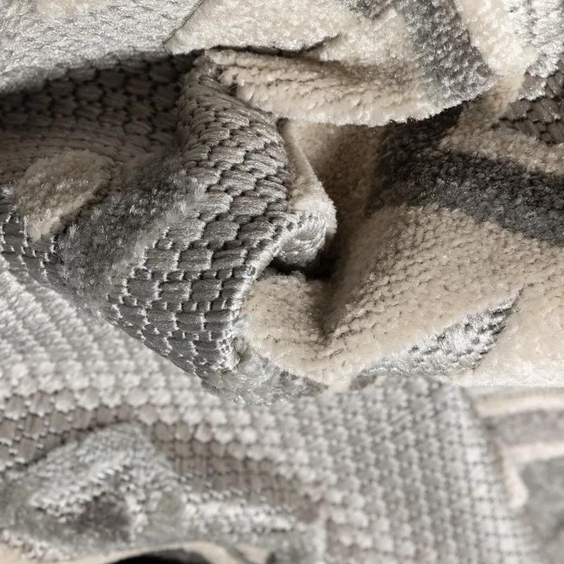Ebern Designs Dickenson Mamba Geometric Grey Indoor/Outdoor Hi-Lo Area Rug