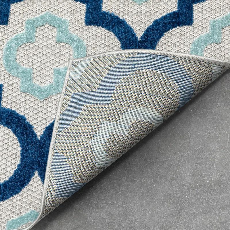 Ebern Designs Dickenson Illuminate Geometric Blue Indoor/Outdoor Hi-Lo Area Rug