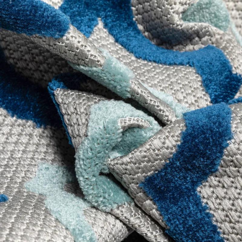 Ebern Designs Dickenson Illuminate Geometric Blue Indoor/Outdoor Hi-Lo Area Rug