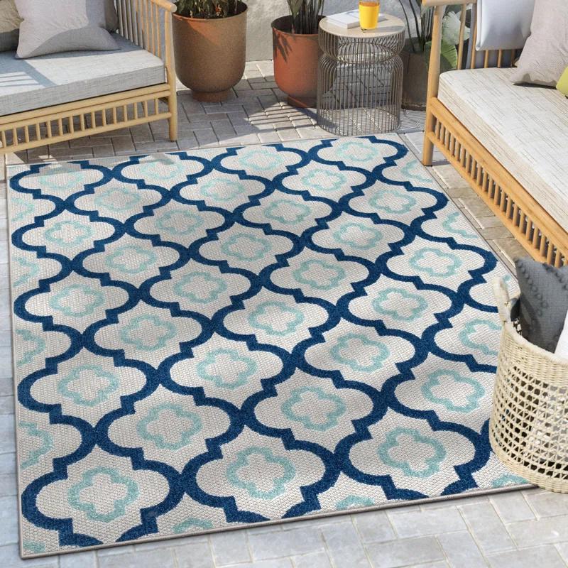 Ebern Designs Dickenson Illuminate Geometric Blue Indoor/Outdoor Hi-Lo Area Rug