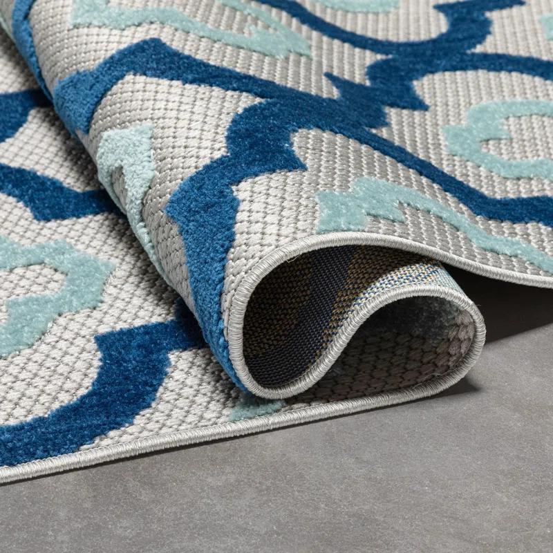 Ebern Designs Dickenson Illuminate Geometric Blue Indoor/Outdoor Hi-Lo Area Rug