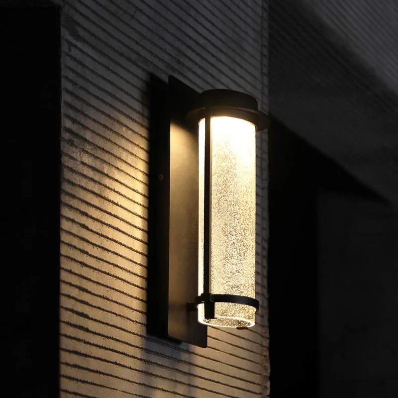 Matte Black Cylinder LED Wall Sconce with Seeded Glass