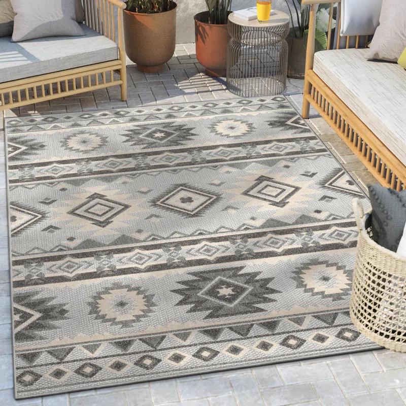 Ebern Designs Dickenson Mamba Geometric Grey Indoor/Outdoor Hi-Lo Area Rug