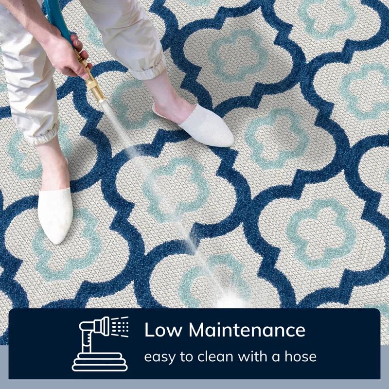 Ebern Designs Dickenson Illuminate Geometric Blue Indoor/Outdoor Hi-Lo Area Rug