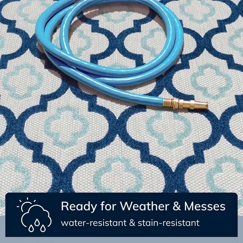 Ebern Designs Dickenson Illuminate Geometric Blue Indoor/Outdoor Hi-Lo Area Rug