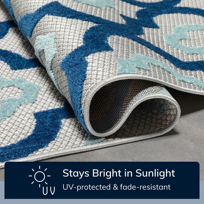 Ebern Designs Dickenson Illuminate Geometric Blue Indoor/Outdoor Hi-Lo Area Rug