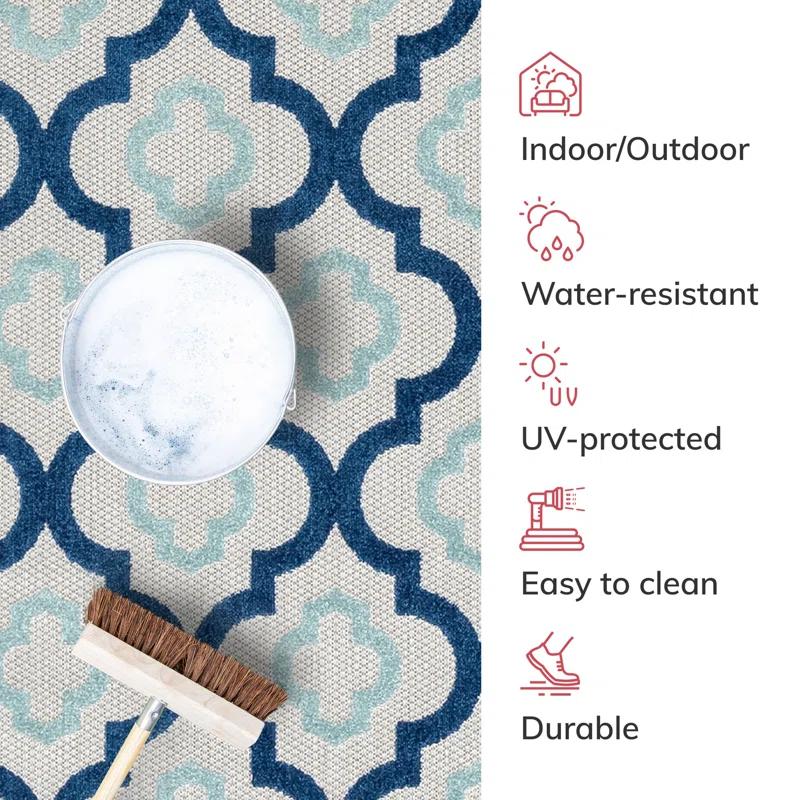 Ebern Designs Dickenson Illuminate Geometric Blue Indoor/Outdoor Hi-Lo Area Rug