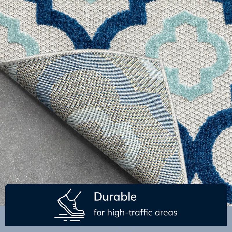 Ebern Designs Dickenson Illuminate Geometric Blue Indoor/Outdoor Hi-Lo Area Rug
