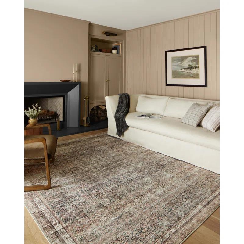 Jules Oriental Power Loomed Polyester Area Rug in Ink / Terracotta