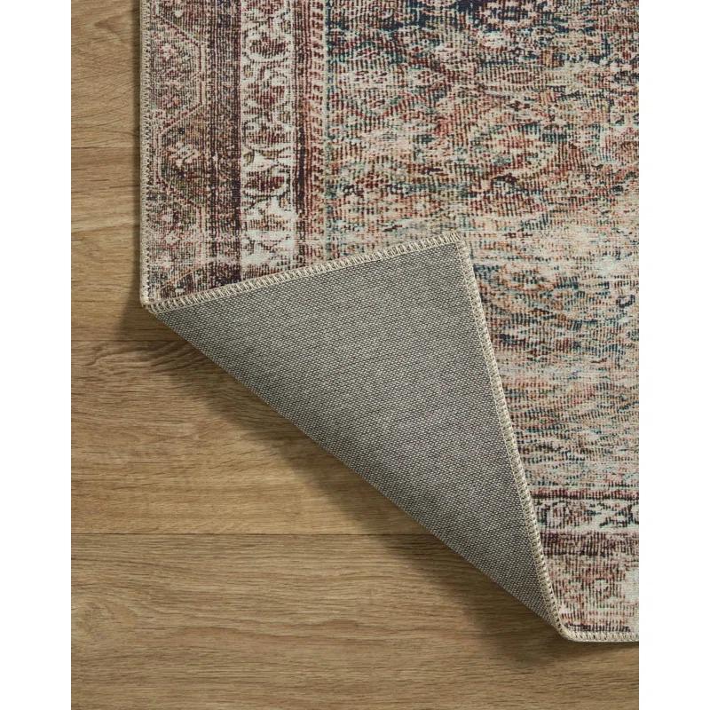 Jules Oriental Power Loomed Polyester Area Rug in Ink / Terracotta