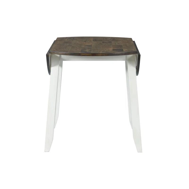 Red Barrel Studio® Clowie Extendable Round Solid Wood Dining Table