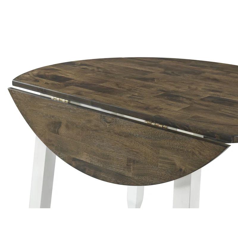 Red Barrel Studio® Clowie Extendable Round Solid Wood Dining Table