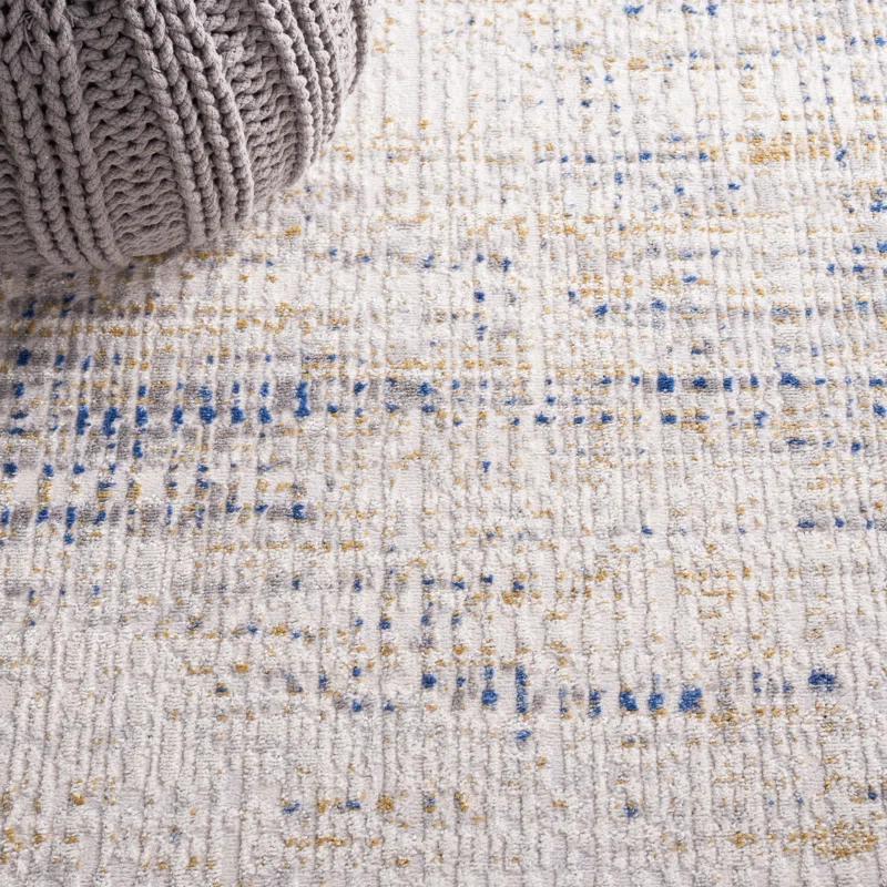 Beige & Blue Abstract Synthetic 9' x 12' Easy-Care Area Rug