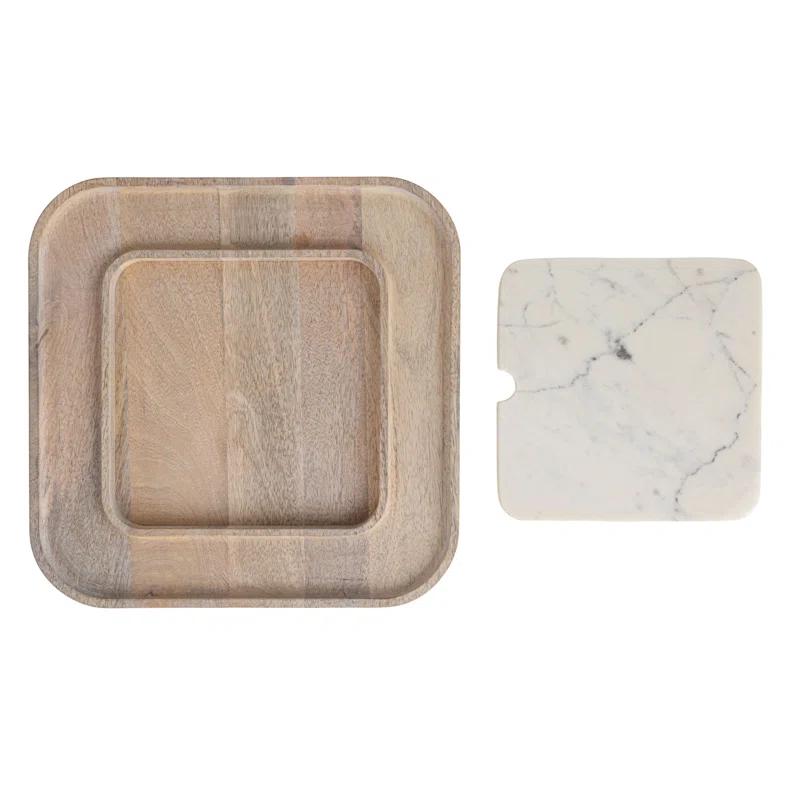 Creative Co-Op Marble And Wood Cutting Board On A Dish