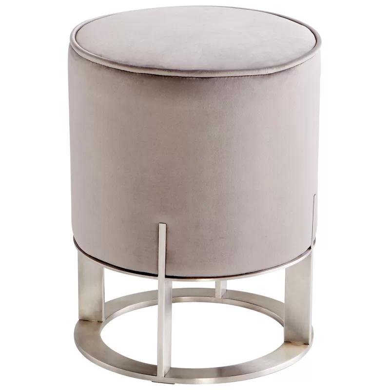 Contemporary Velvet-Cushioned Round Ottoman in Brushed Steel