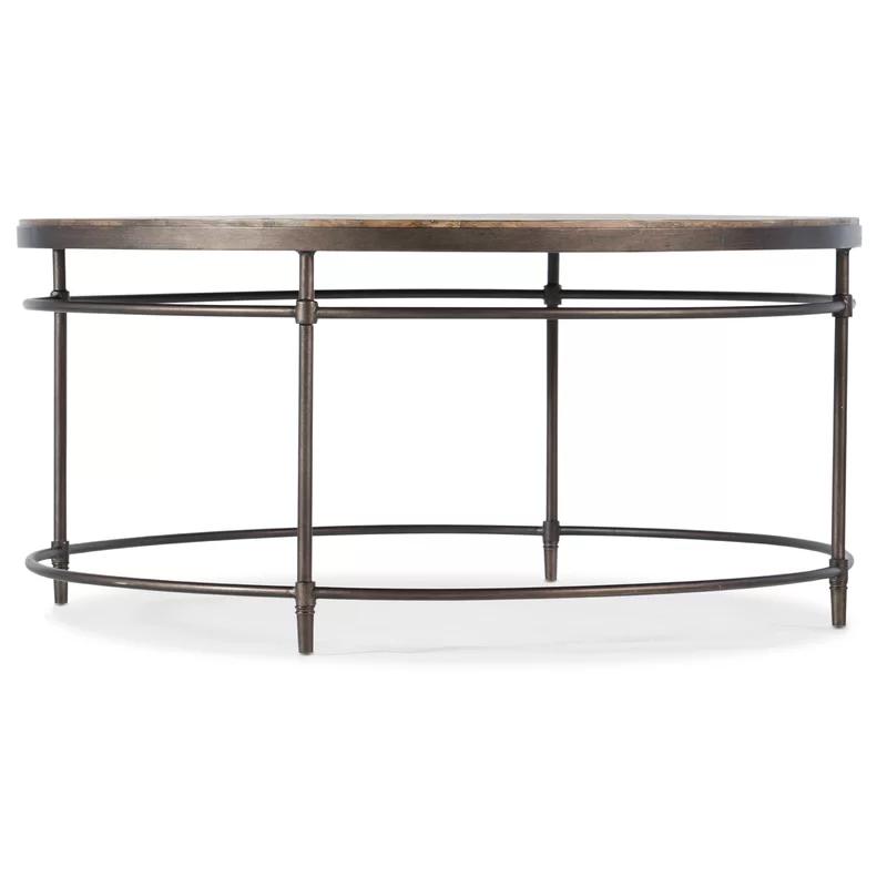 Transitional Round Cocktail Table with Storage in Black and Brown