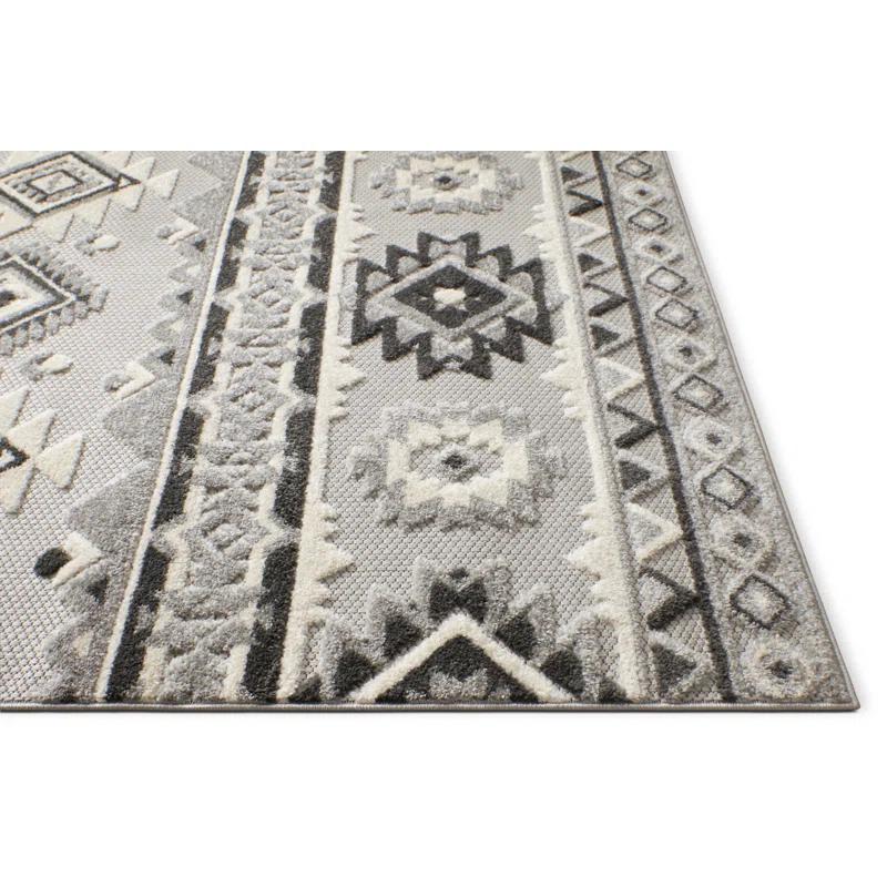 Ebern Designs Dickenson Mamba Geometric Grey Indoor/Outdoor Hi-Lo Area Rug