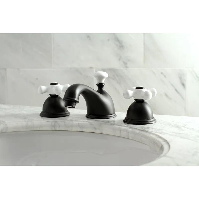 Kingston Brass Restoration Two-Handle 3-Hole Deck Mount Widespread Bathroom Faucet with Brass Pop-Up Drain