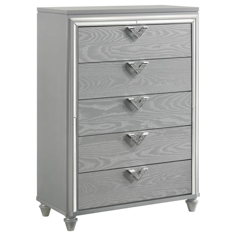 Benjara Haley Tall Dresser Chest, V Shaped Glittering Metal Handles, Light Silver