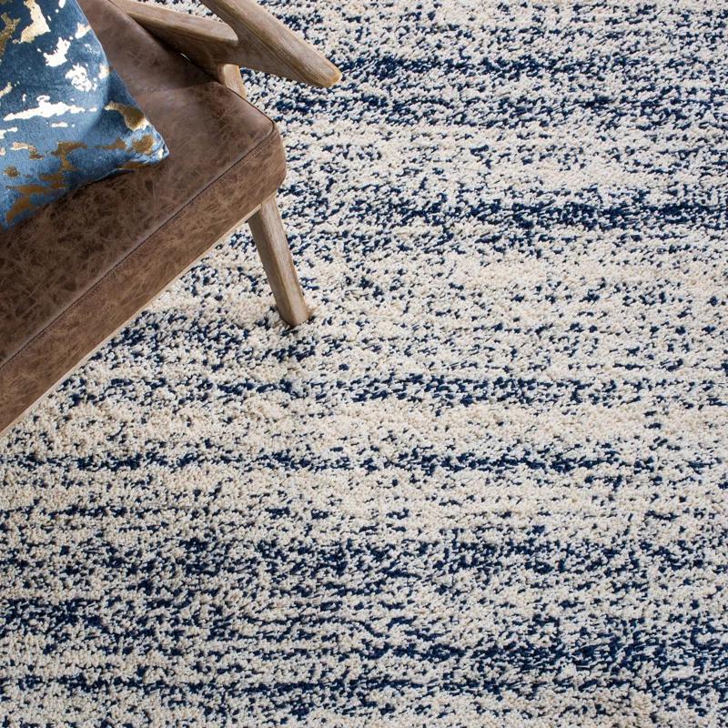 Audriauna Ivory/Navy Area Rug